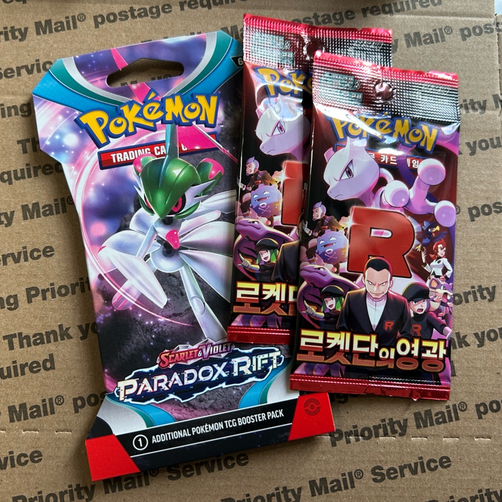 Pokemon TCG: Paradox Rift Sleeved Booster Pack + 2 Glory of Team Rocket Packs